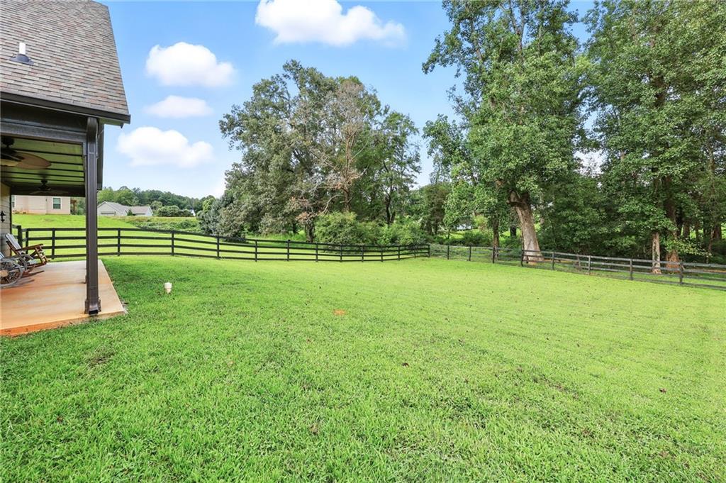 5911 Bent Tree Way Clermont, GA 30527 - Photo 8 of 56 a view of a golf course with a play ground