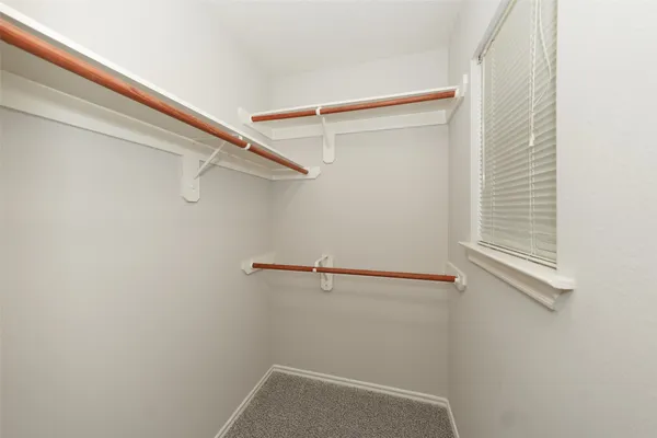 a view of a room with racks on the wall