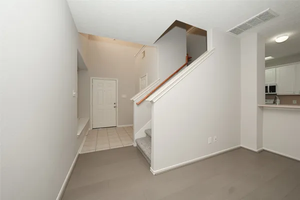 a view of hallway with stairs