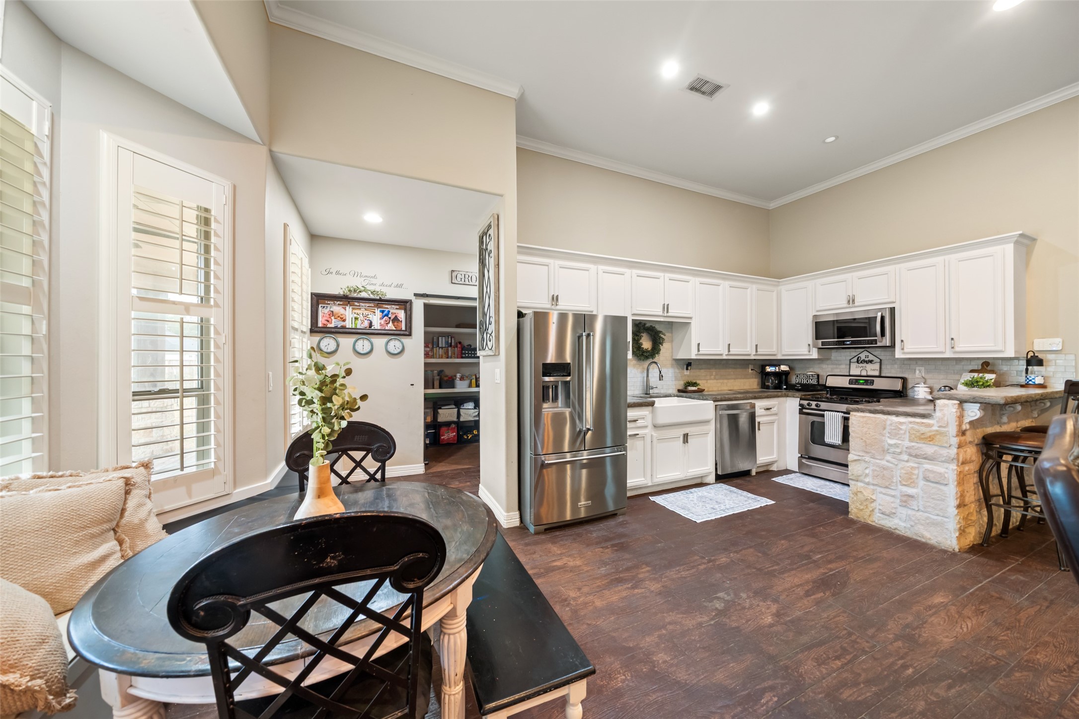 120 County Road Splendora, TX 77372 - Photo 11 of 22 View from the breakfast nook...looking into the kitchen and the large pantry in the hallway. The pantry door is a beautiful rustic barn door