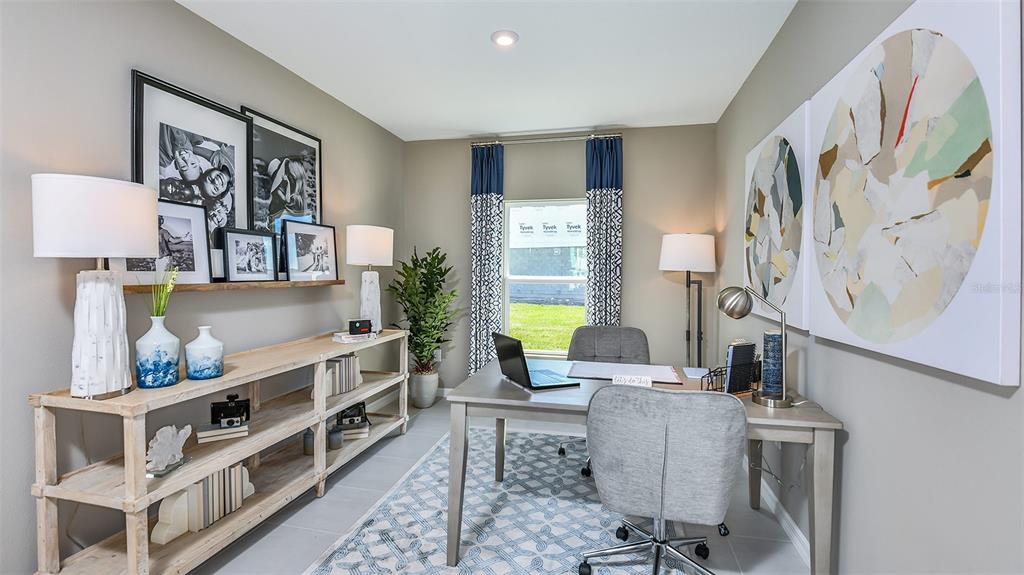 13709 Shellmore Avenue Palmetto, FL 34221 - Photo 9 of 17 a room with furniture and window