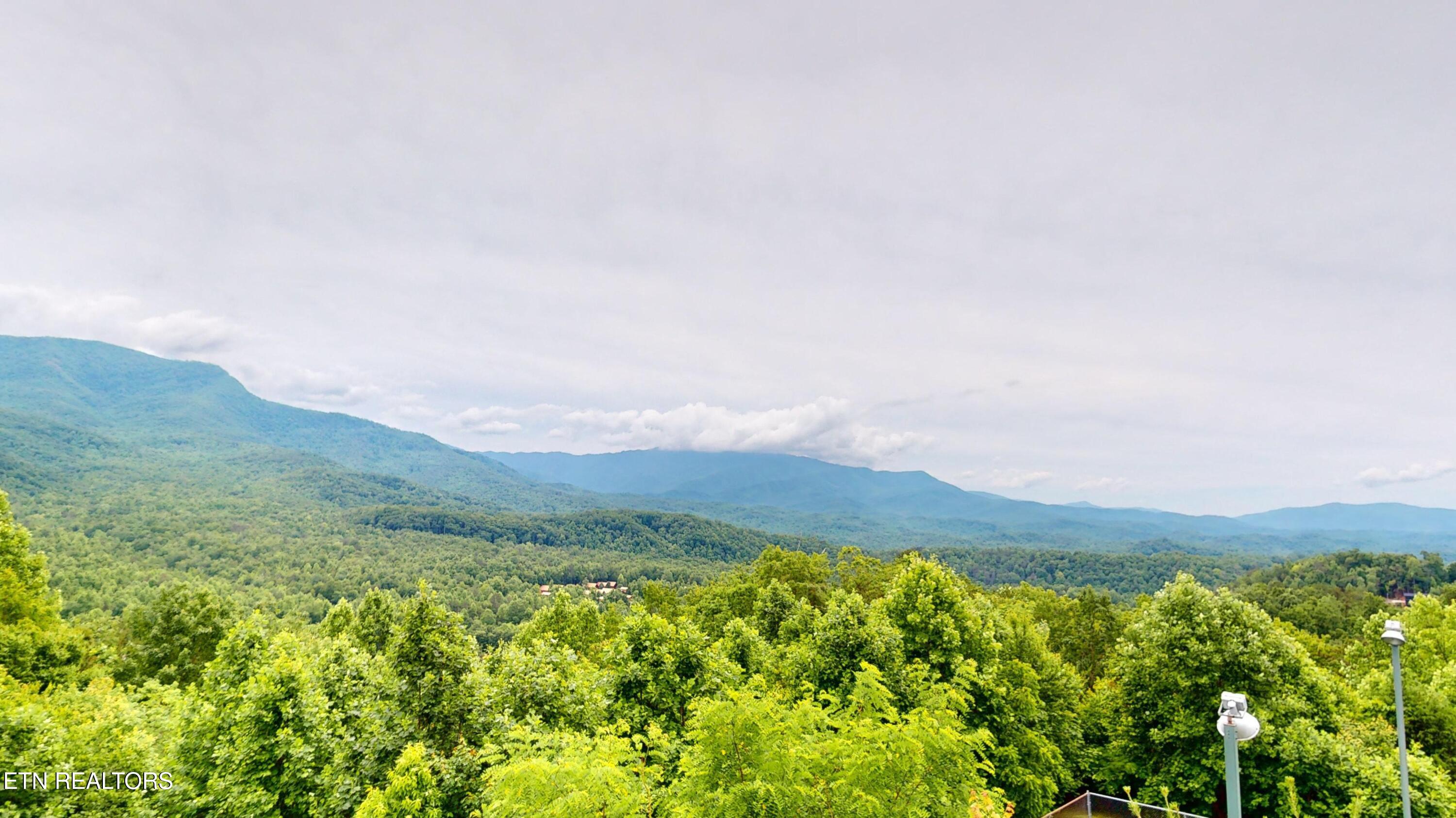 3710 Weber Road, Unit 102A Gatlinburg, TN 37738 - Photo 25 of 30 Deer-Ridge-Unit-102A-Clubhouse-Deck-View
