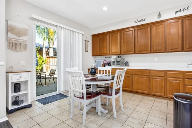 a kitchen with a stove a sink and a refrigerator
