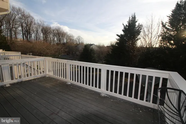 a view of deck and backyard