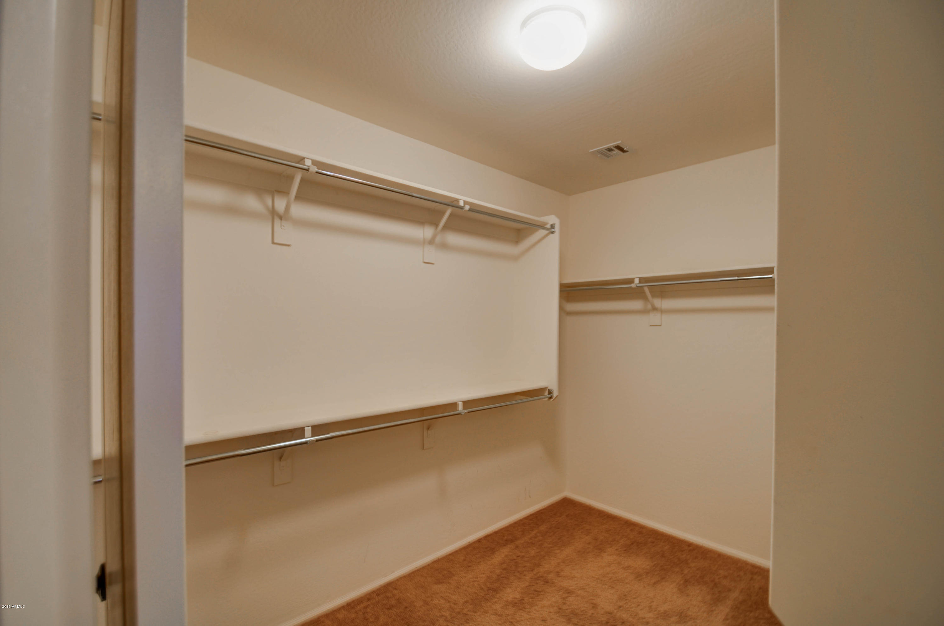 4613 West Carson Road Laveen, AZ 85339 - Photo 25 of 37 master bed closet
