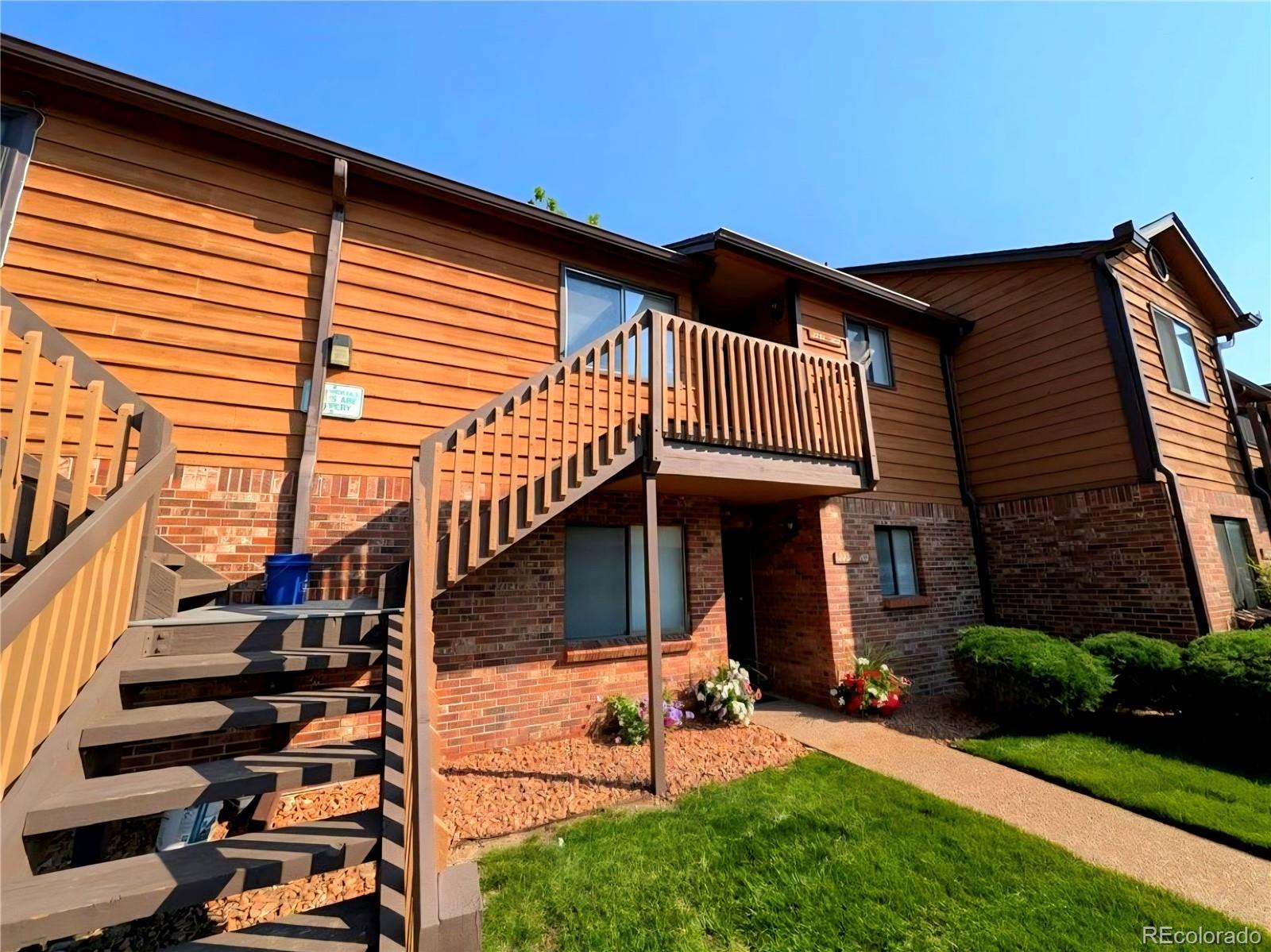 2231 South Buckley Road, Unit 202 Aurora, CO 80013 - Photo 1 of 10 a view of backyard with deck