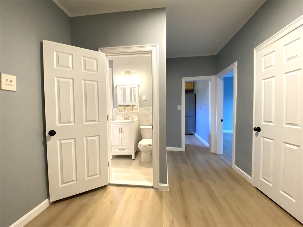 31 Queensberry Street, Unit 19 Boston, MA 02215 - Photo 6 of 6 a view of a bathroom with a sink and a toilet