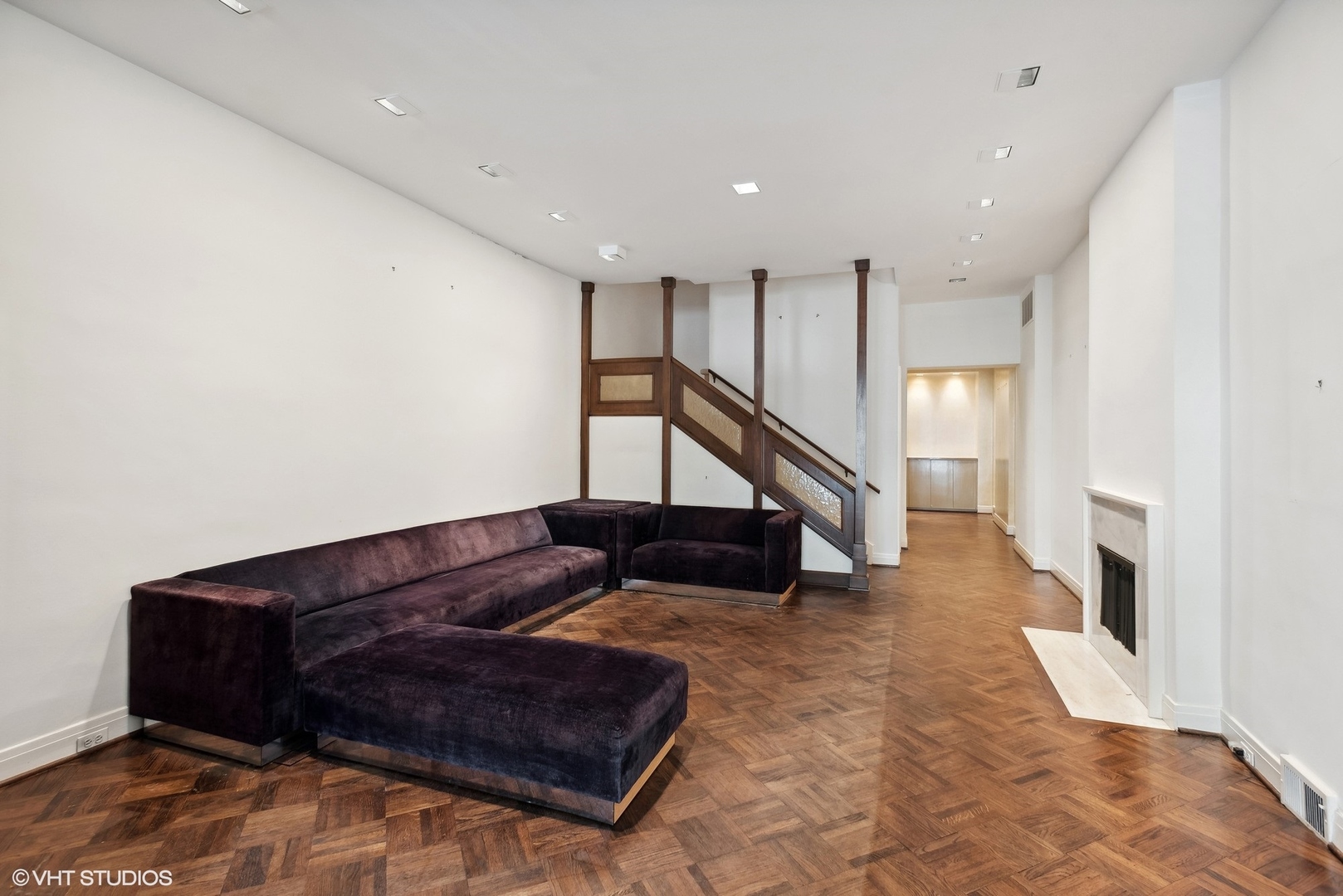 43 East Elm Street Chicago, IL 60611 - Photo 3 of 17 a living room with furniture and stairs