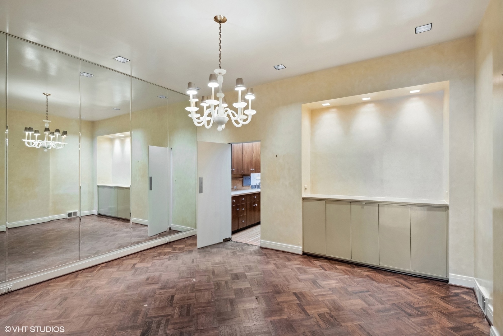 43 East Elm Street Chicago, IL 60611 - Photo 4 of 17 a view of a hallway with a chandelier