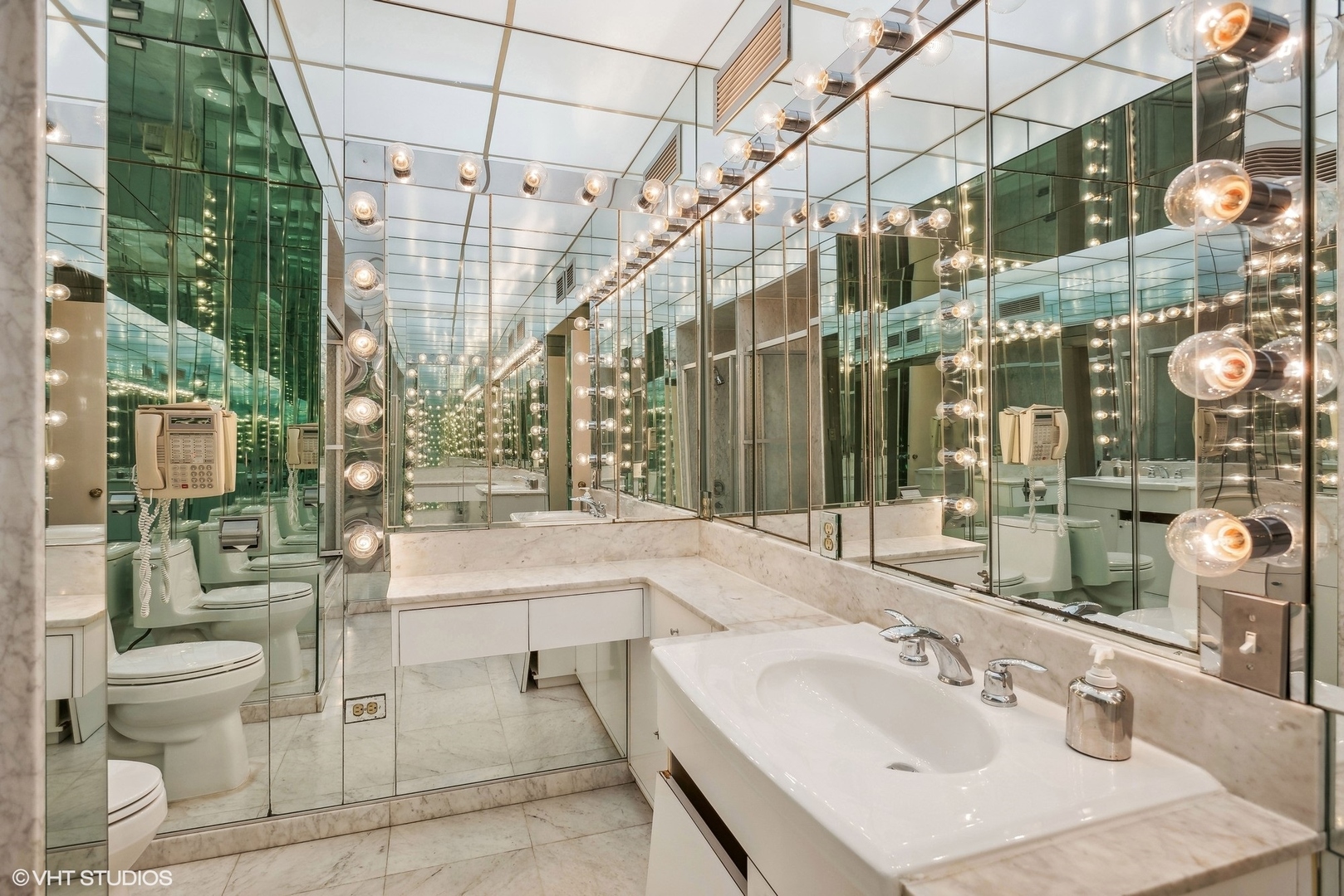 43 East Elm Street Chicago, IL 60611 - Photo 9 of 17 a bathroom with a sink and toilet