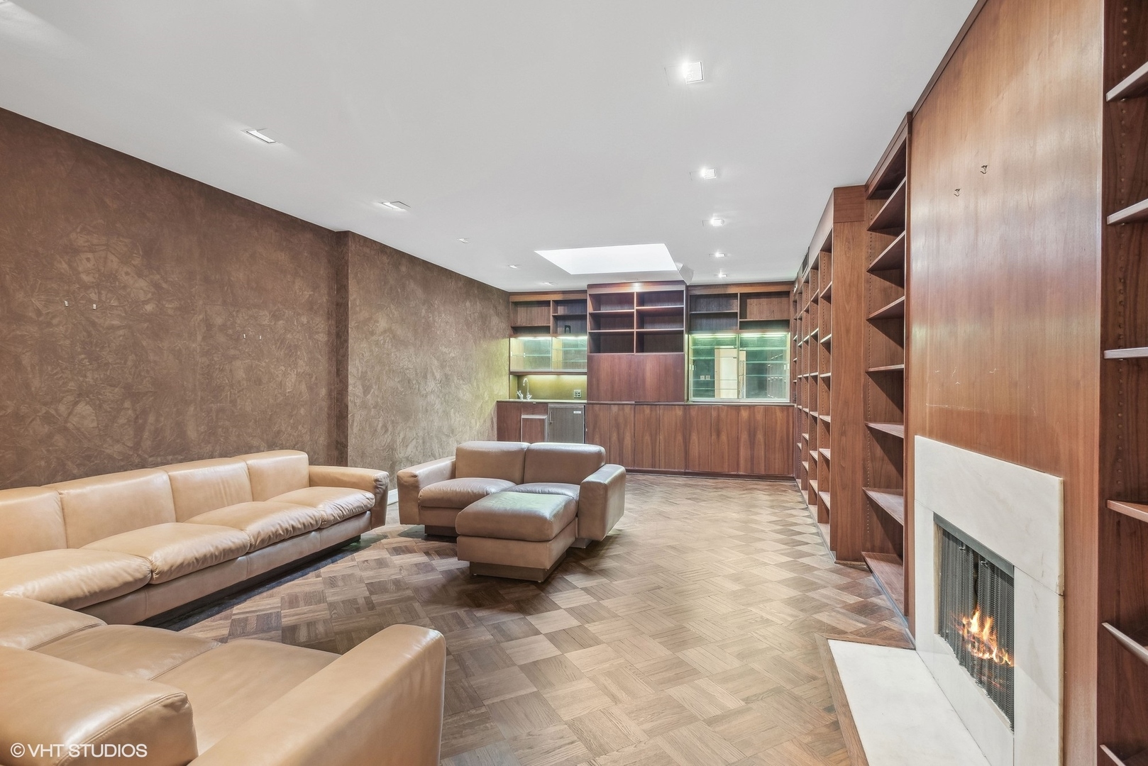 43 East Elm Street Chicago, IL 60611 - Photo 10 of 17 a living room with furniture and a fireplace