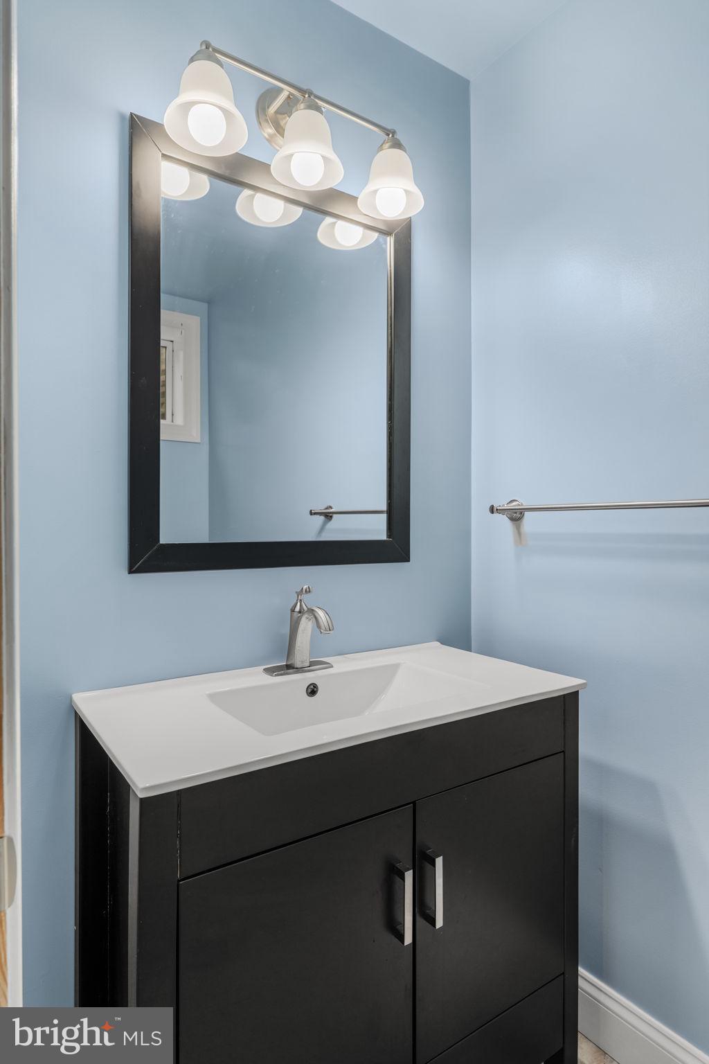 305 Partridge Drive Lititz, PA 17543 - Photo 31 of 46 a bathroom with a sink and a mirror
