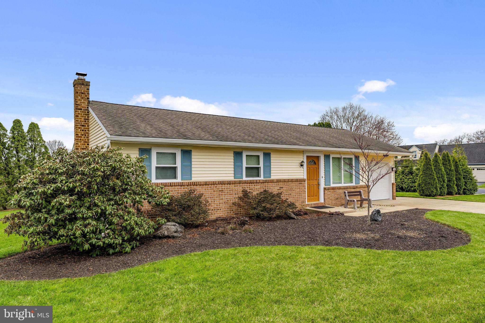 305 Partridge Drive Lititz, PA 17543 - Photo 36 of 46 a backyard of a house with table and chairs