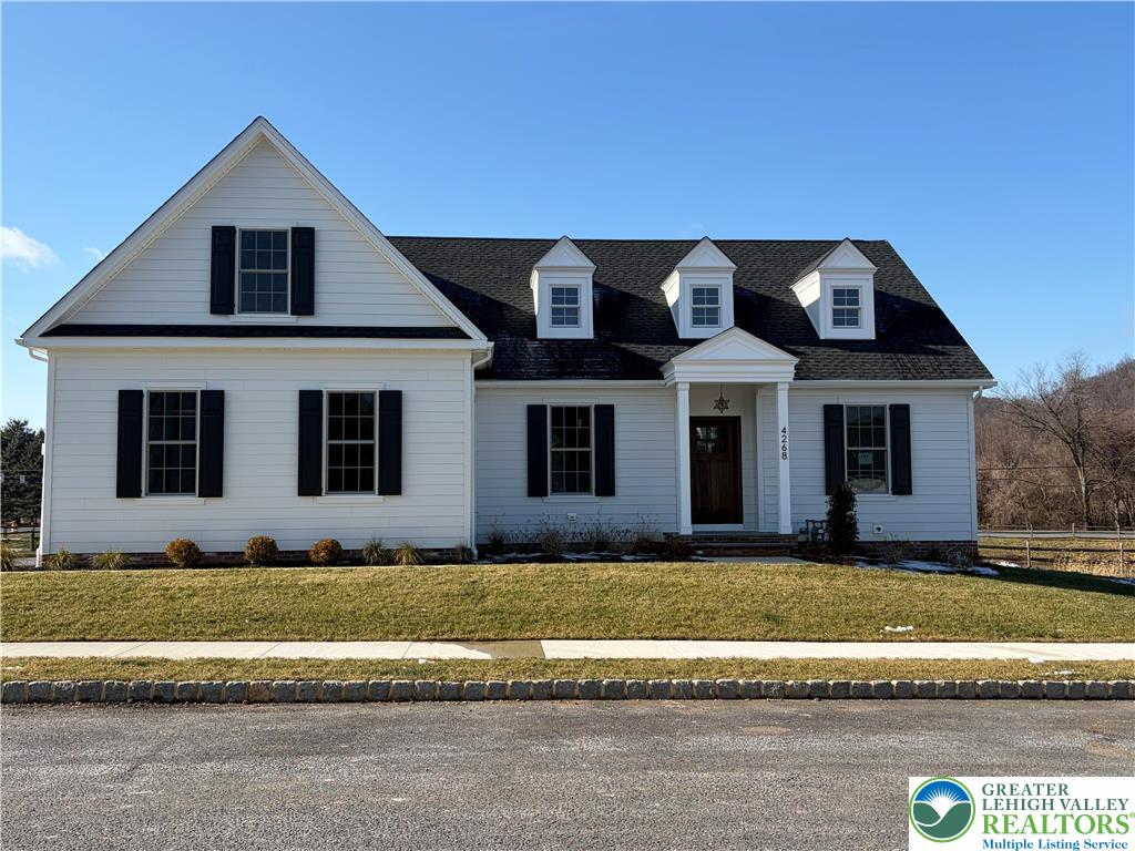 4268 Stonebridge Drive Bethlehem, PA 18015 - Photo 1 of 37 a front view of a house with a yard
