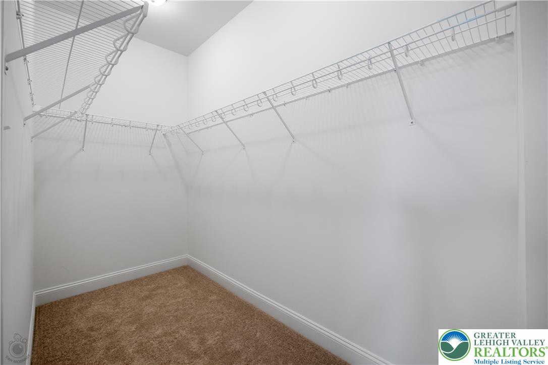 4268 Stonebridge Drive Bethlehem, PA 18015 - Photo 27 of 37 a small space with a fan