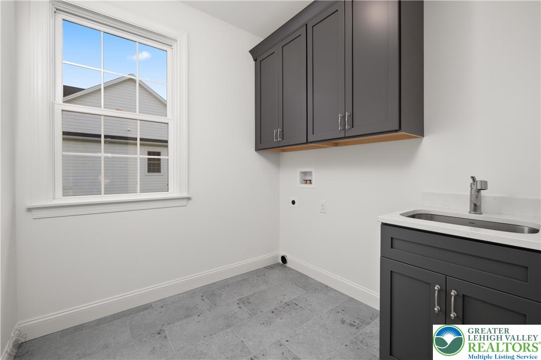 4268 Stonebridge Drive Bethlehem, PA 18015 - Photo 29 of 37 a kitchen with a sink and a cabinets