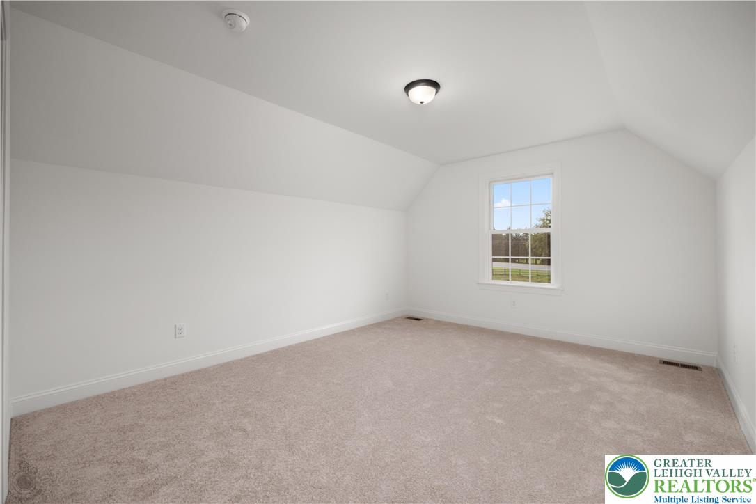 4268 Stonebridge Drive Bethlehem, PA 18015 - Photo 32 of 37 an empty room with windows