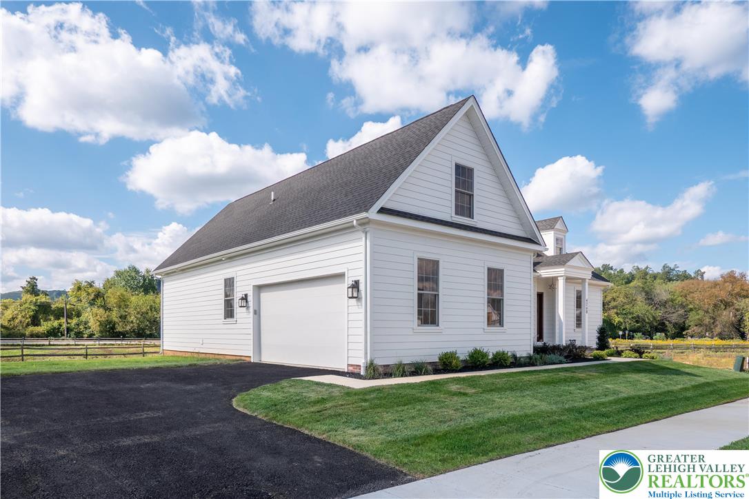 4268 Stonebridge Drive Bethlehem, PA 18015 - Photo 36 of 37 a view of a house with a yard