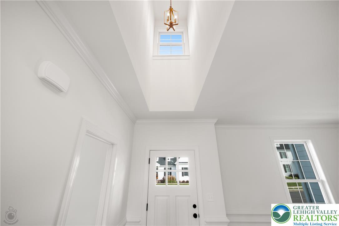 4268 Stonebridge Drive Bethlehem, PA 18015 - Photo 8 of 37 a view of an entryway with wooden floor