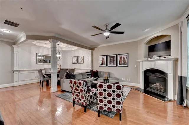 a work room with furniture and a book shelf