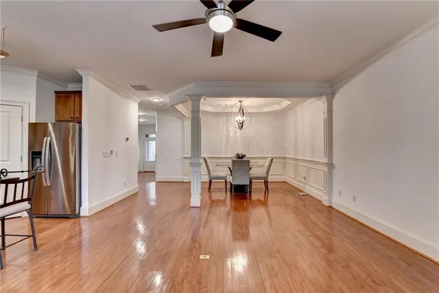 a bathroom with a toilet a sink and a mirror