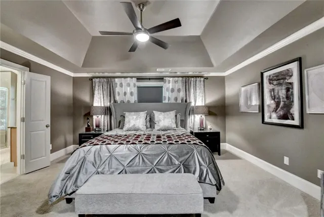 a living room with furniture a rug and a window