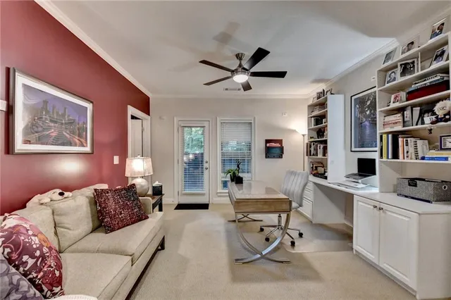 a view of a balcony with a green space