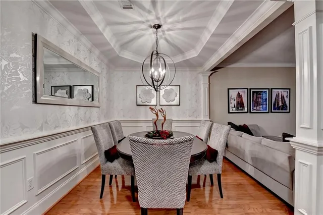 a view of a livingroom with furniture and a ceiling fan