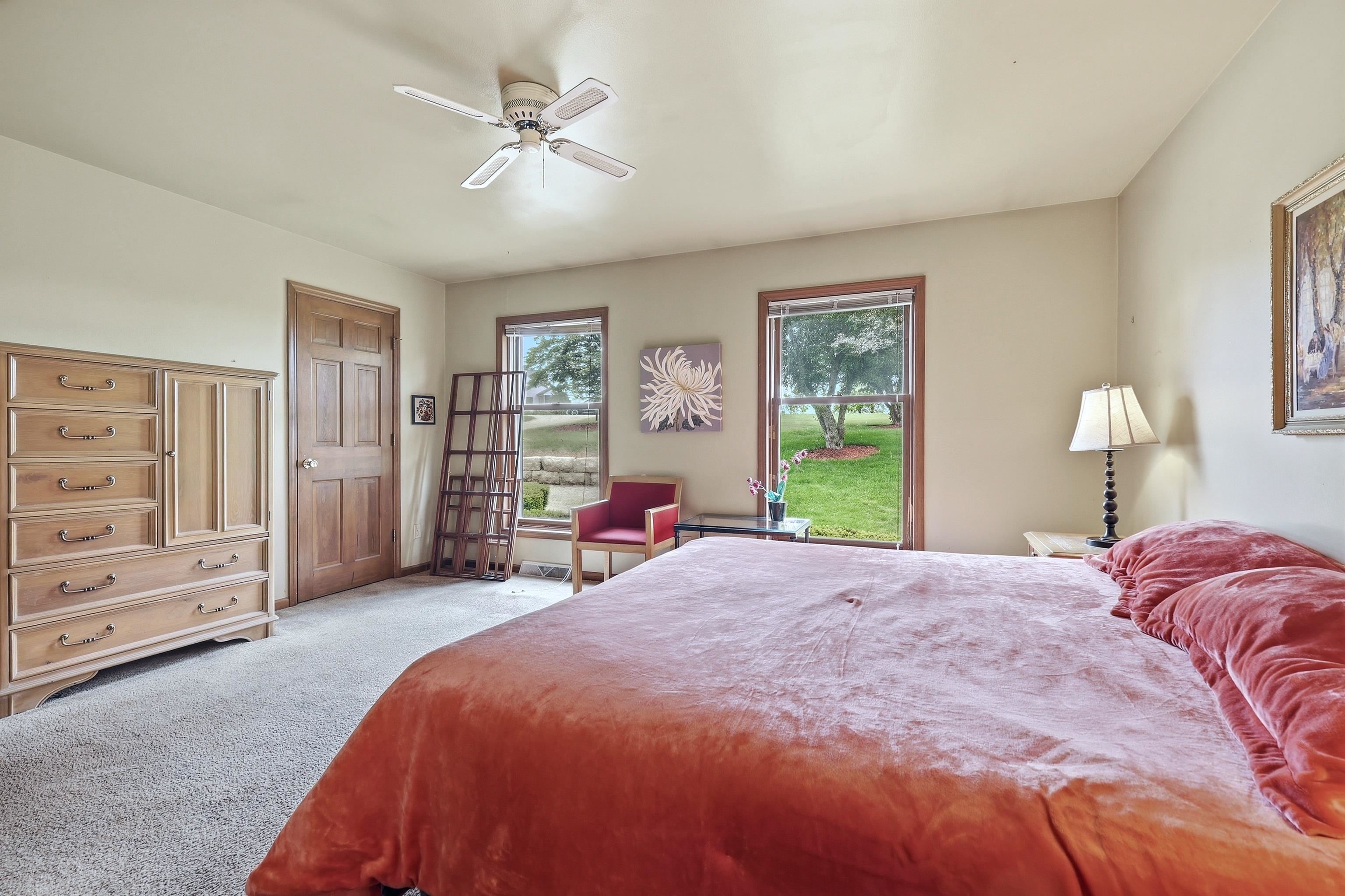 13 Signal Point Lane Galena, IL 61036 - Photo 8 of 47 a spacious bedroom with a bed and a window