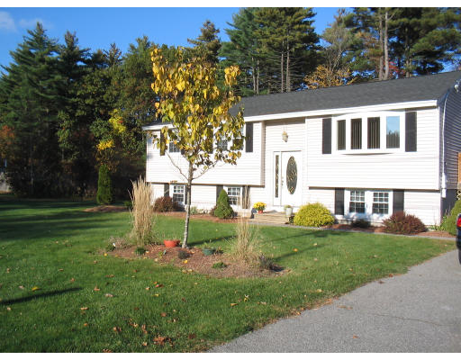 14 Governor Hutchinson Road Billerica, MA 01821 - Photo 2 of 9 a view of a house with a yard