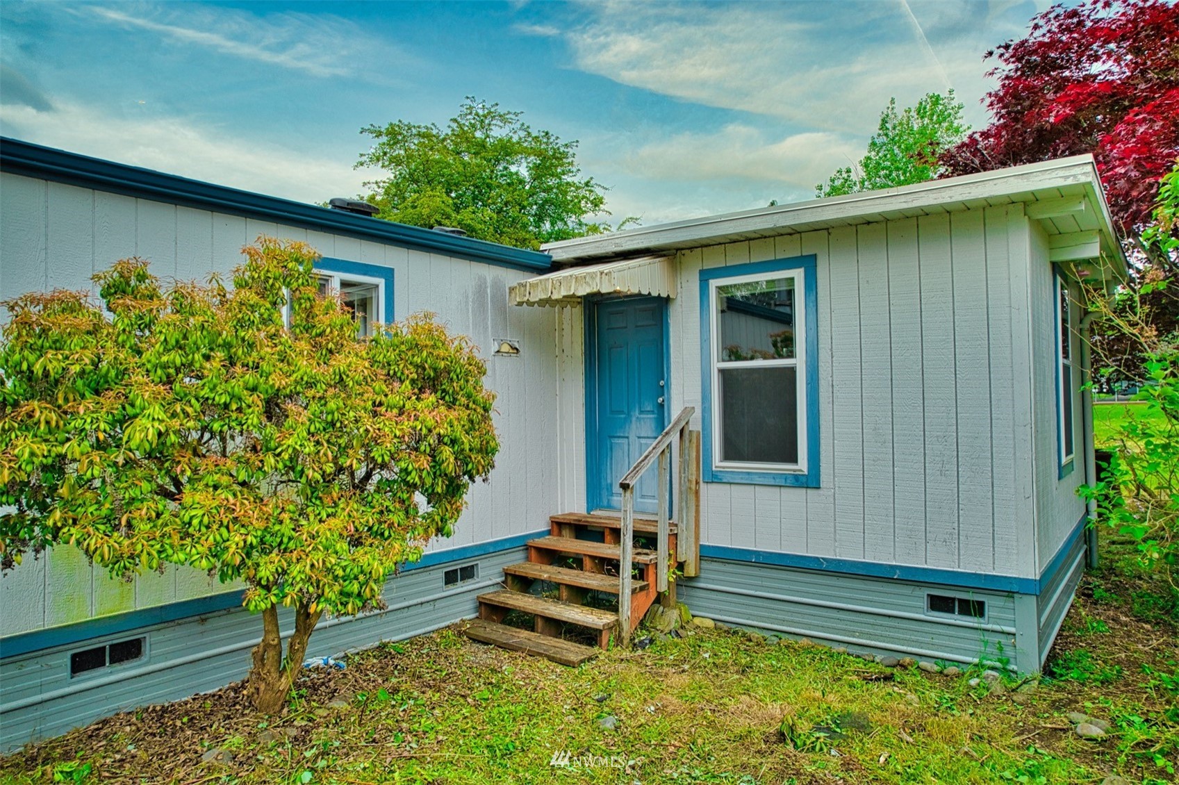7240 183rd Avenue Southwest Rochester, WA 98579 - Photo 29 of 35 a backyard of a house with lots of green space