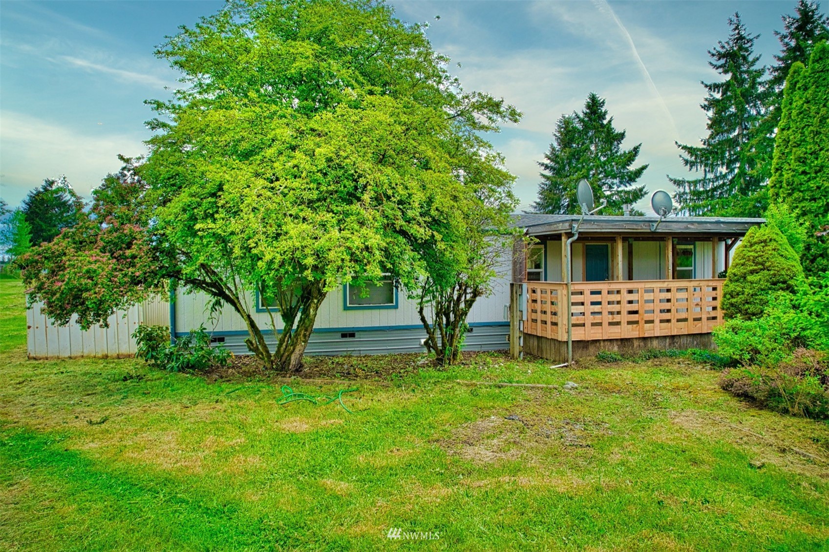 7240 183rd Avenue Southwest Rochester, WA 98579 - Photo 3 of 35 a view of a house with a yard