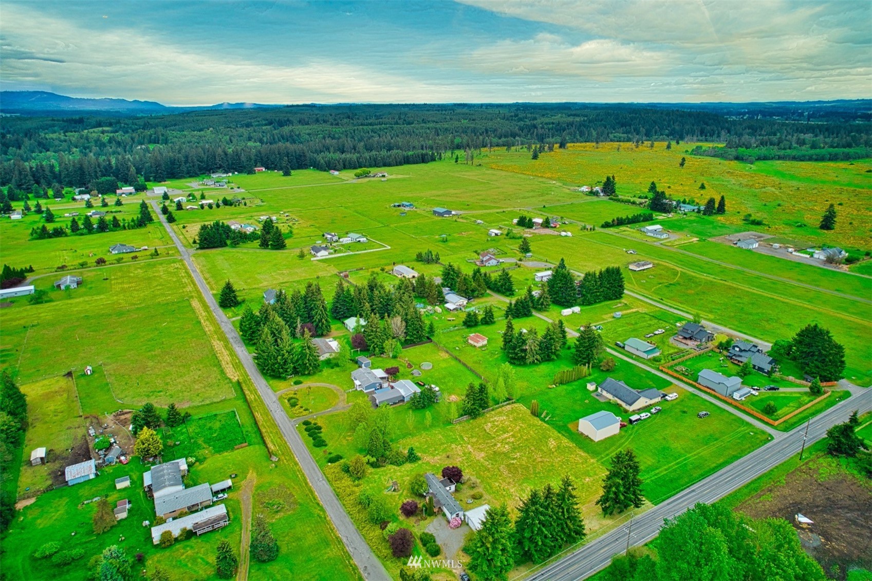 7240 183rd Avenue Southwest Rochester, WA 98579 - Photo 33 of 35 a view of a field with an ocean