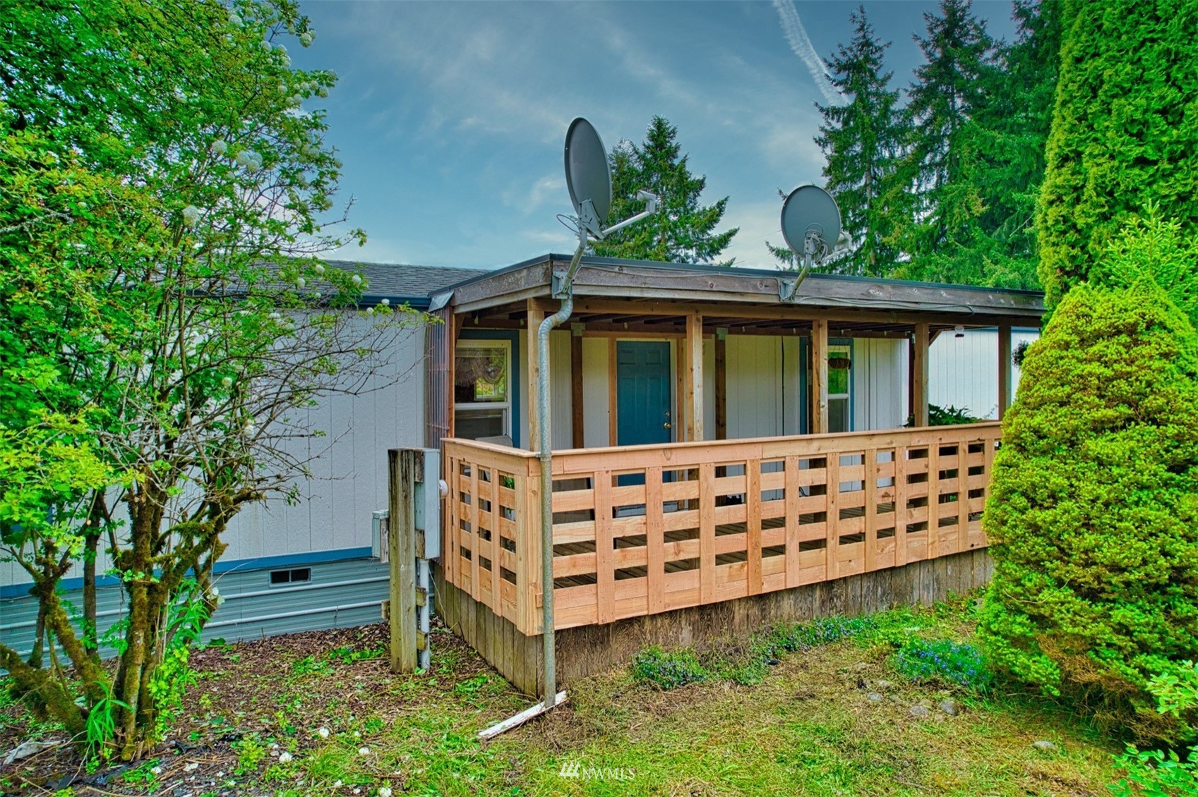 7240 183rd Avenue Southwest Rochester, WA 98579 - Photo 8 of 35 a view of house with a yard and potted plants