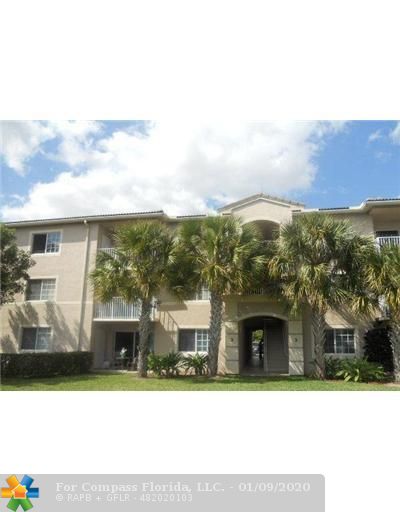 5011 Wiles Road, Unit 103 Coconut Creek, FL 33073 - Photo 7 of 8 Exterior Back