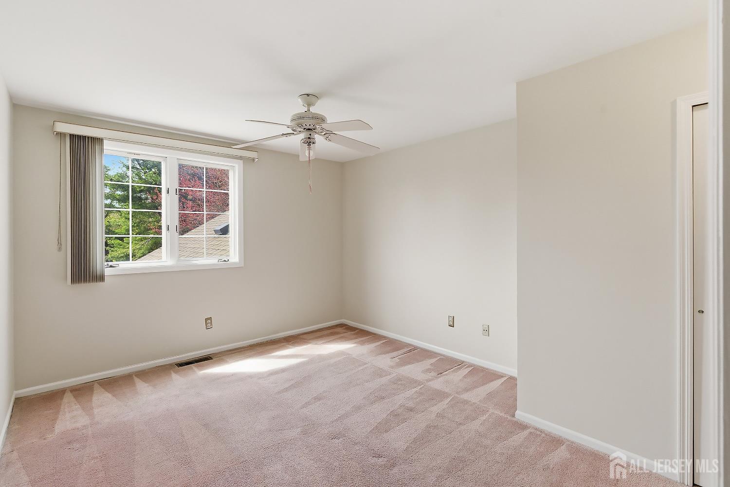 34 Rutland Lane, Unit B Monroe Township, NJ 08831 - Photo 23 of 45 an empty room with a window