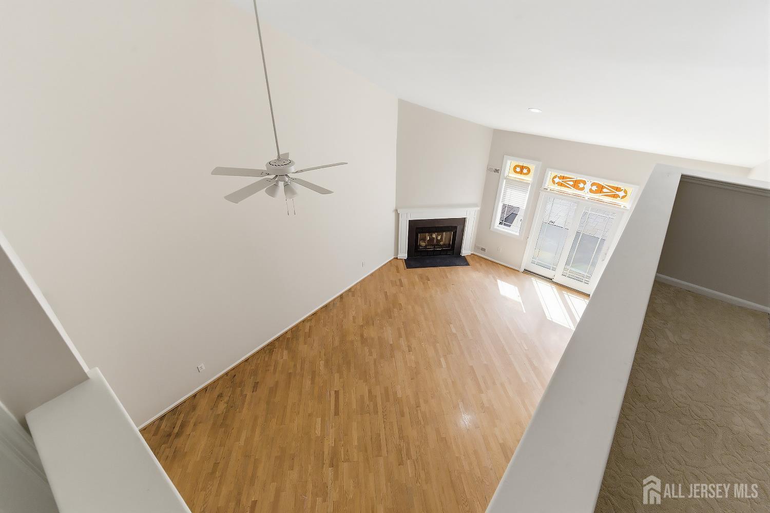34 Rutland Lane, Unit B Monroe Township, NJ 08831 - Photo 25 of 45 a view of a livingroom with wooden floor
