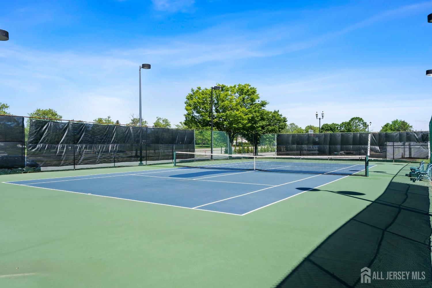 34 Rutland Lane, Unit B Monroe Township, NJ 08831 - Photo 40 of 45 a view of a tennis court