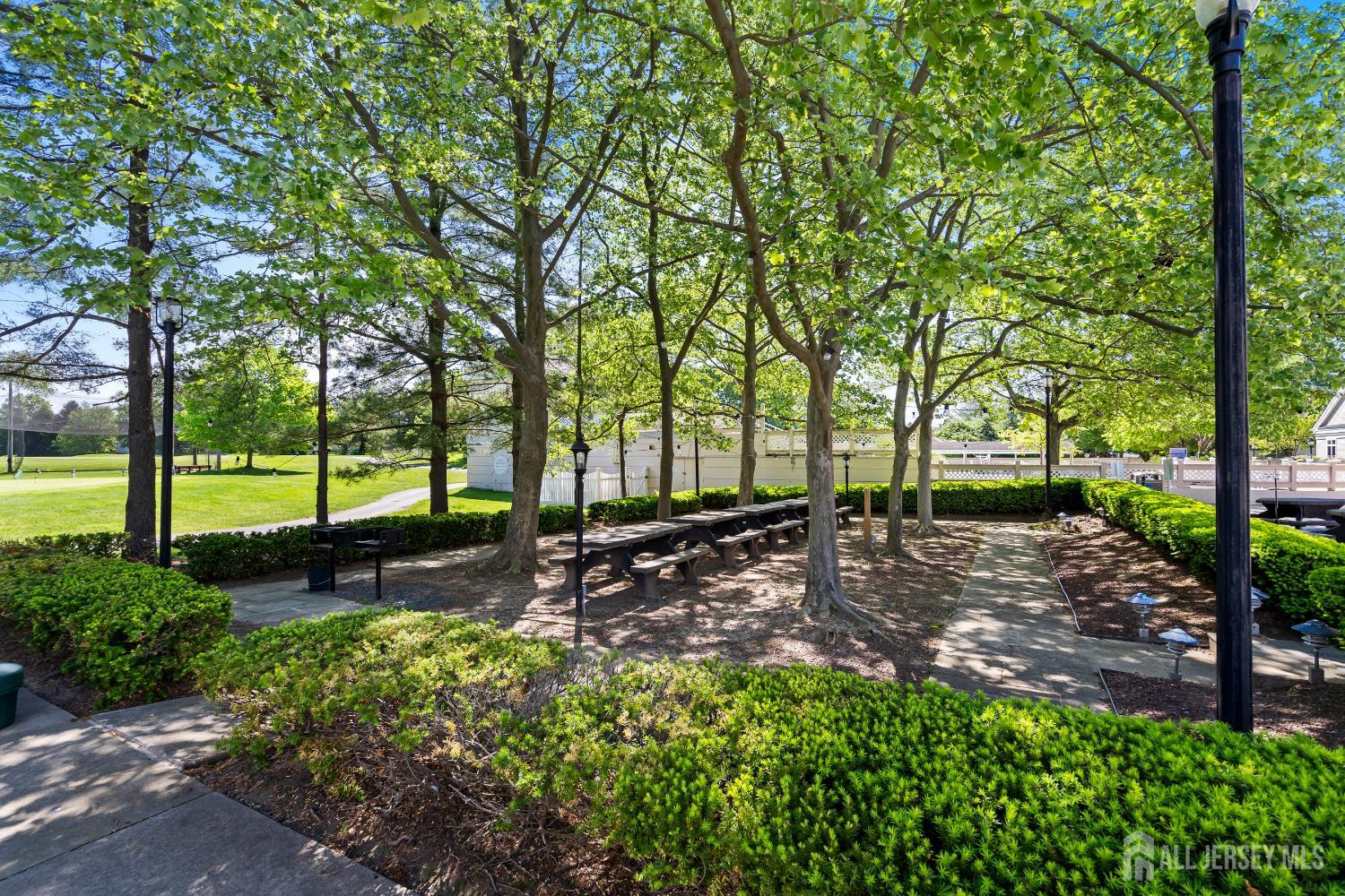 34 Rutland Lane, Unit B Monroe Township, NJ 08831 - Photo 45 of 45 a view of a park with large trees
