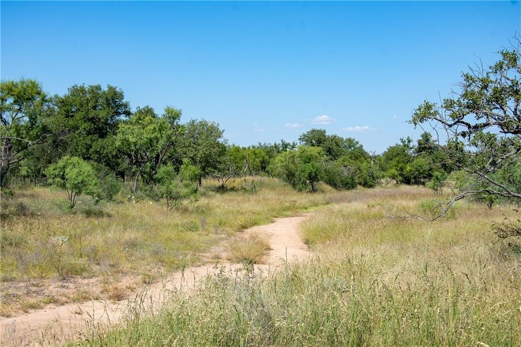 405 County Road 405 Valley Spring, TX 76885 - Photo 25 of 40 a view of a lake view with houses in back