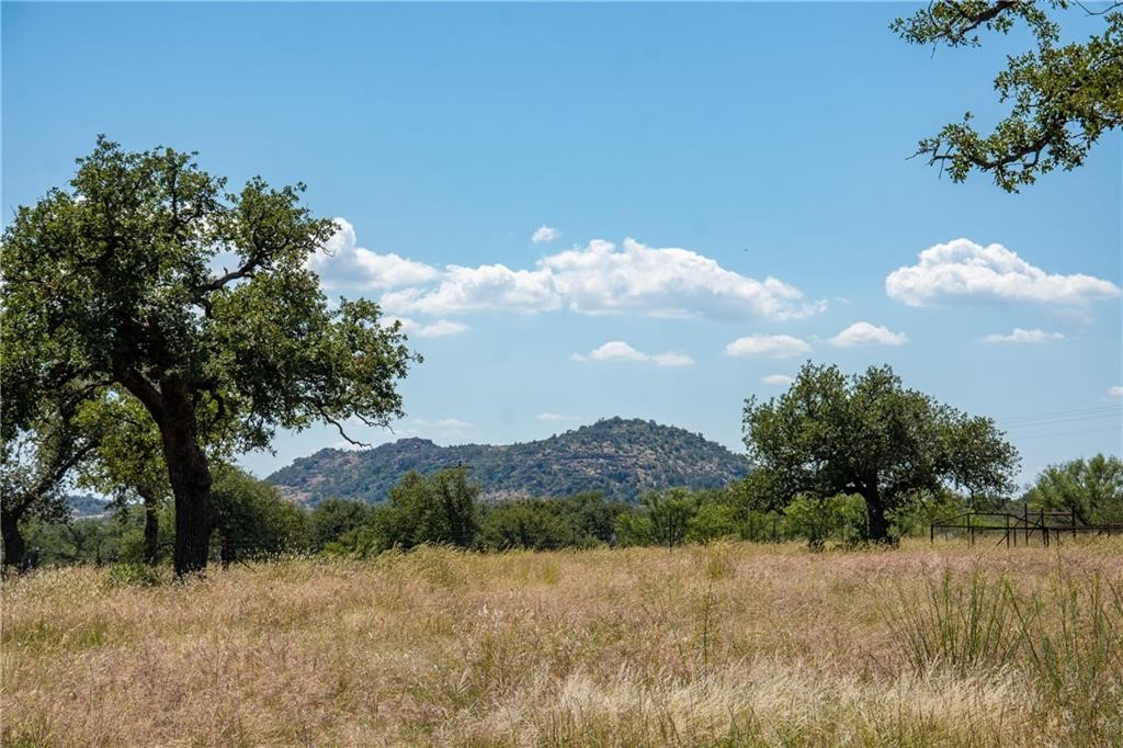 405 County Road 405 Valley Spring, TX 76885 - Photo 27 of 40 a view of a lake and mountain in the back