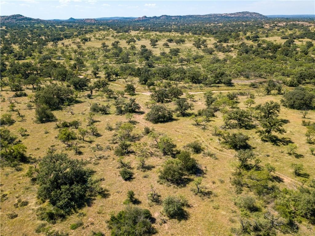 405 County Road 405 Valley Spring, TX 76885 - Photo 33 of 40 an aerial view of residential houses with outdoor space