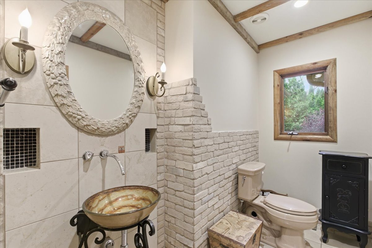 39 Mockingbird Lane Oak Brook, IL 60523 - Photo 11 of 57 a bathroom with a toilet and a sink