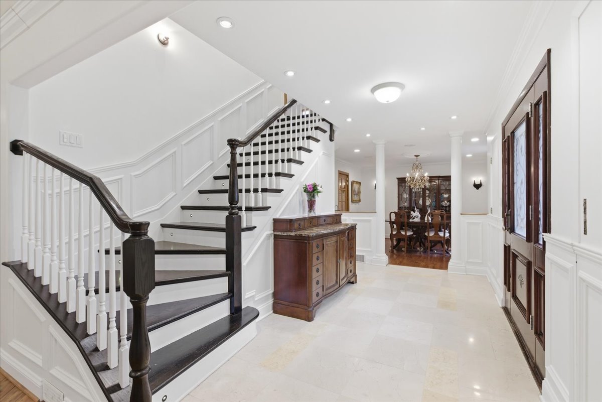 39 Mockingbird Lane Oak Brook, IL 60523 - Photo 24 of 57 a view of entryway with livingroom and stairs