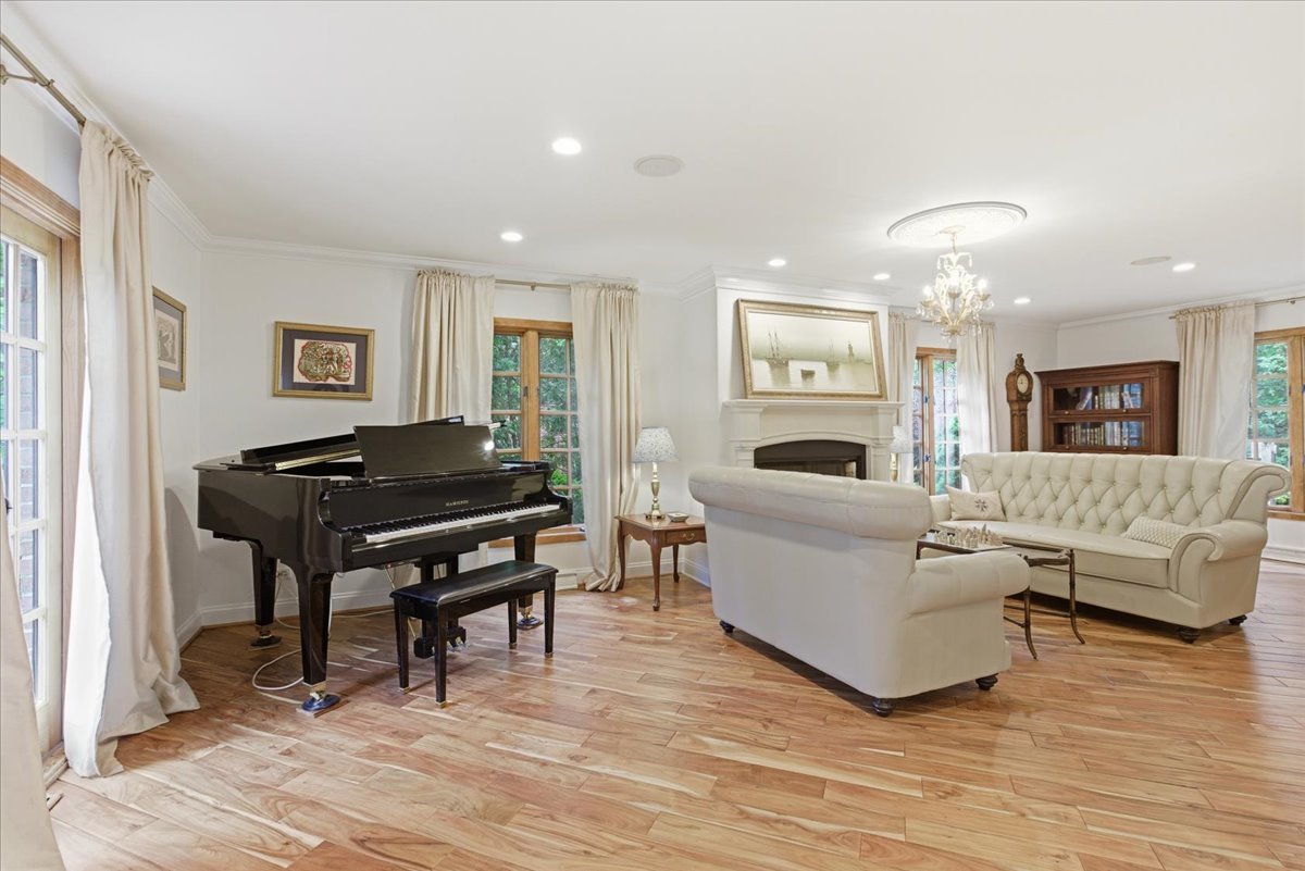 39 Mockingbird Lane Oak Brook, IL 60523 - Photo 7 of 57 a living room with furniture and a wooden floor