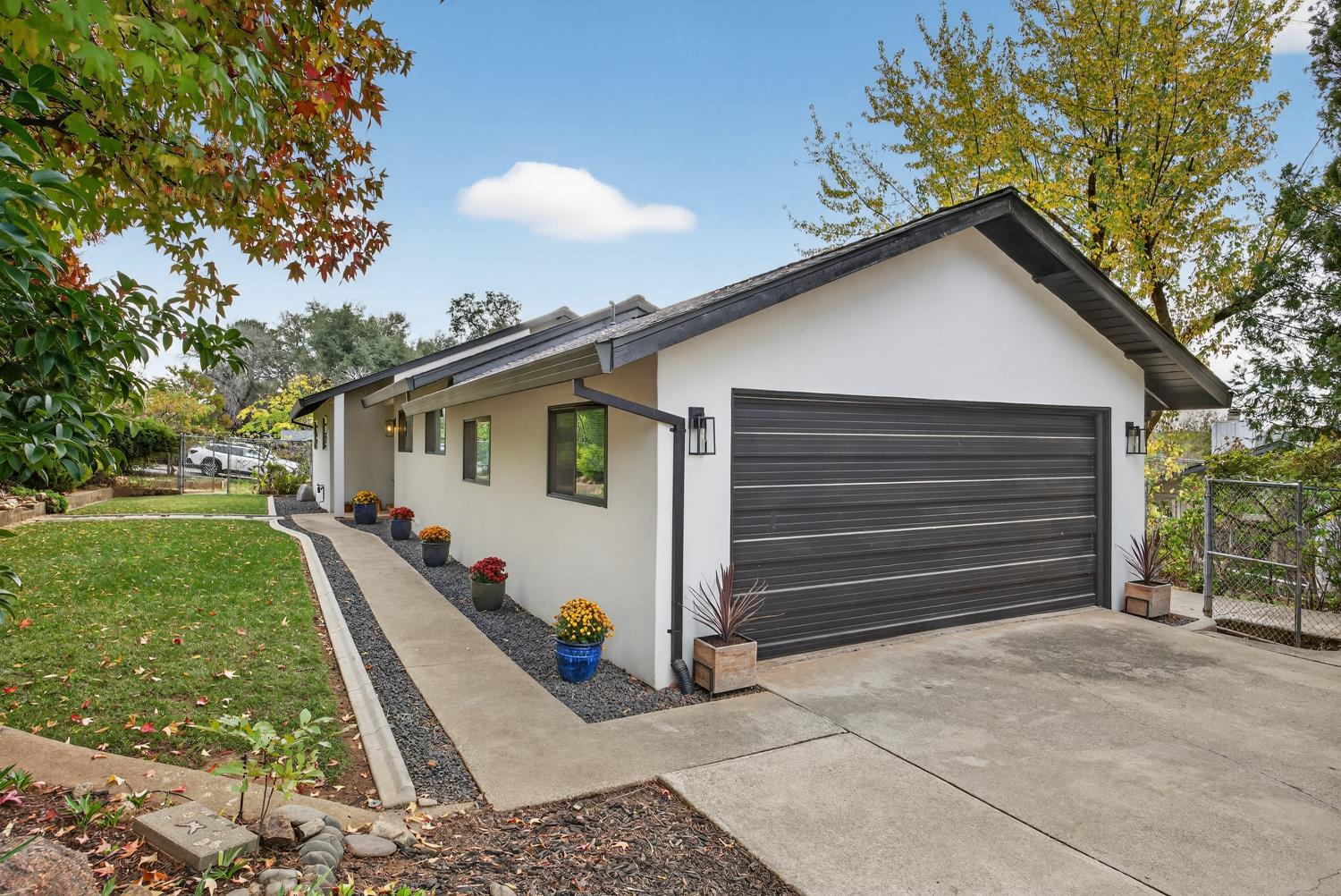 2280 Pinon Road Rescue, CA 95672 - Photo 1 of 1 a front view of a house with a yard
