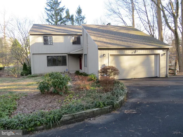 a front view of house with yard