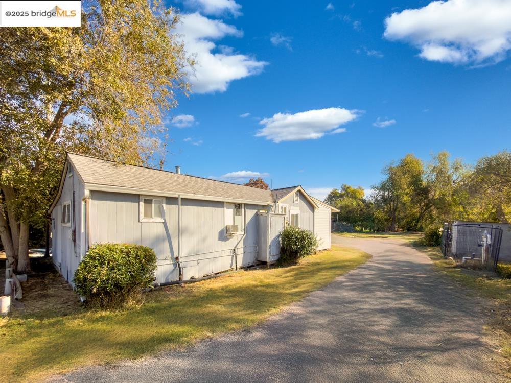 2140 Dutch Slough Road Oakley, CA 94561 - Photo 13 of 24 a view of a house with a yard and garage