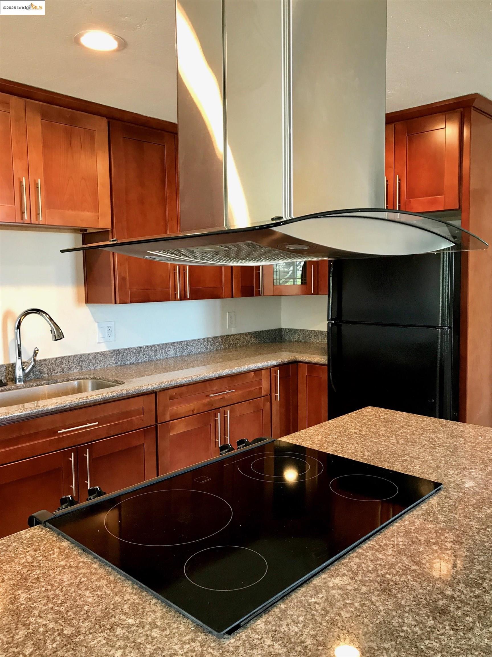 2140 Dutch Slough Road Oakley, CA 94561 - Photo 24 of 24 a kitchen with a sink and cabinets