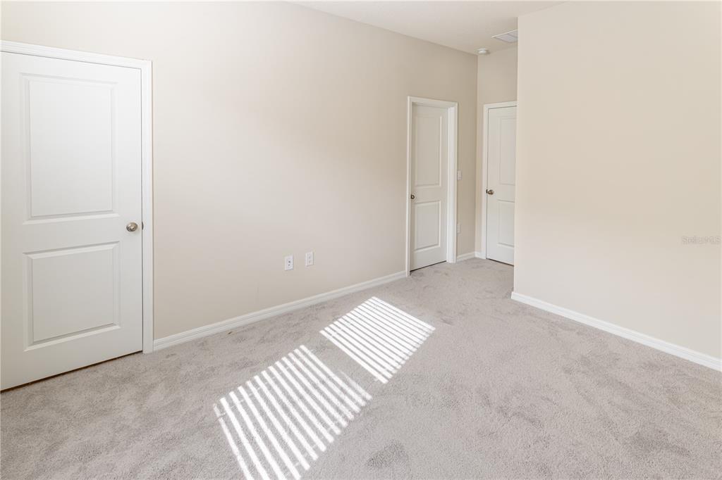 32183 Conchshell Sail Street Wesley Chapel, FL 33545 - Photo 12 of 45 a view of an empty room